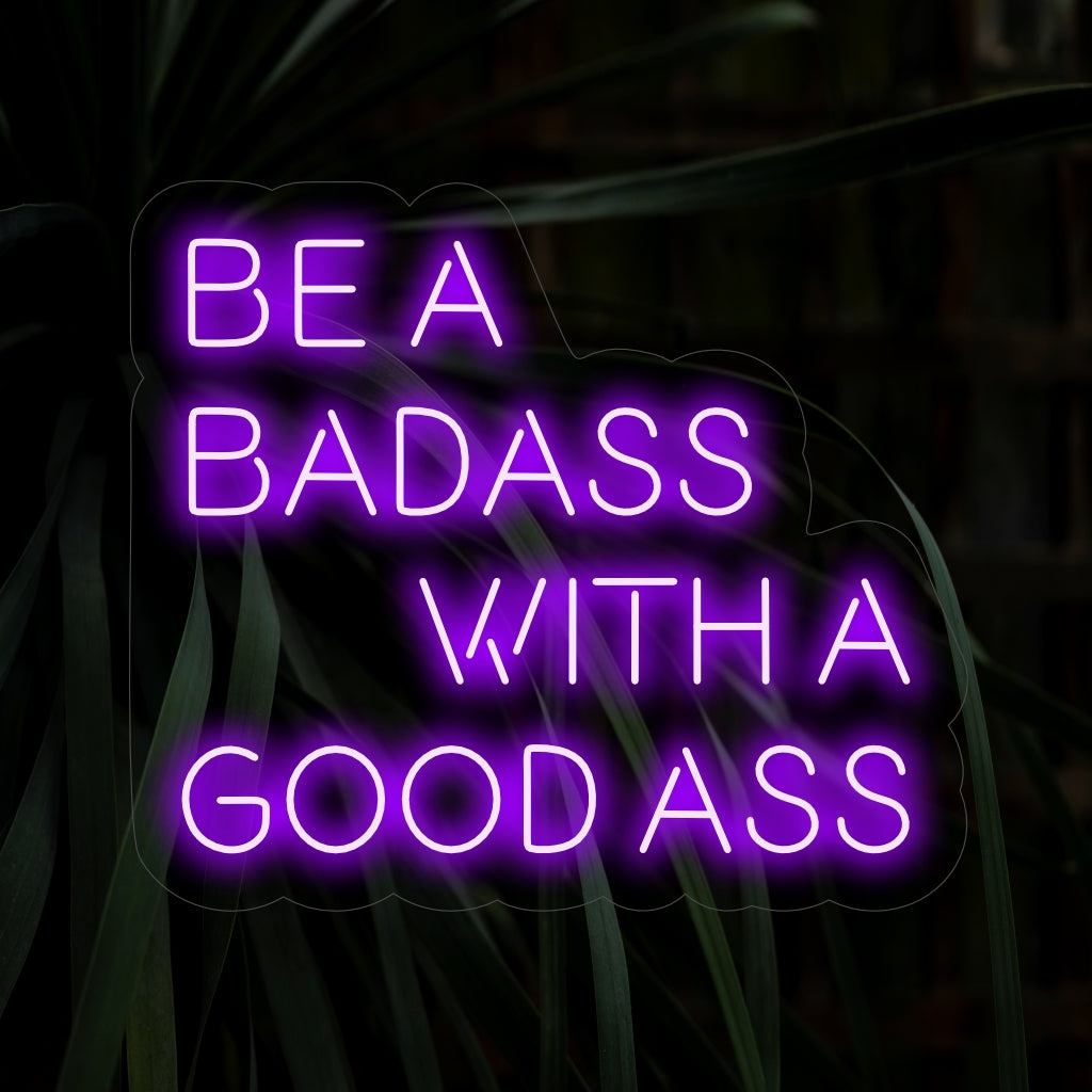 "Be a Badass with a Good Ass Neon Sign" - Rohkea neonvalo, jossa on motivoiva lause, joka tuo itsevarmuutta ja näppäryyttä asuintilaasi.