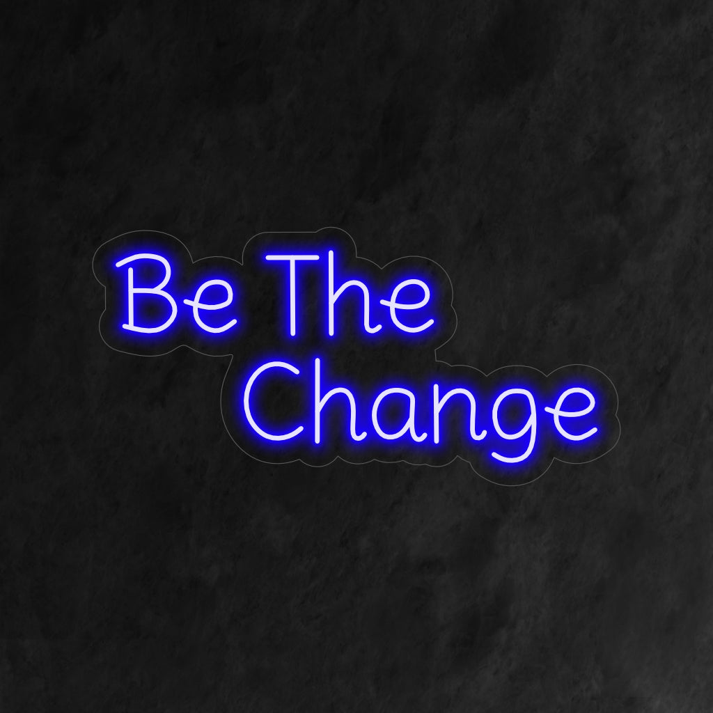 "Be the Change Neon Sign" - Tehokas neonvalo, jossa on inspiroiva viesti, joka tuo positiivisuutta ja voimaannuttamista asuintilaasi.