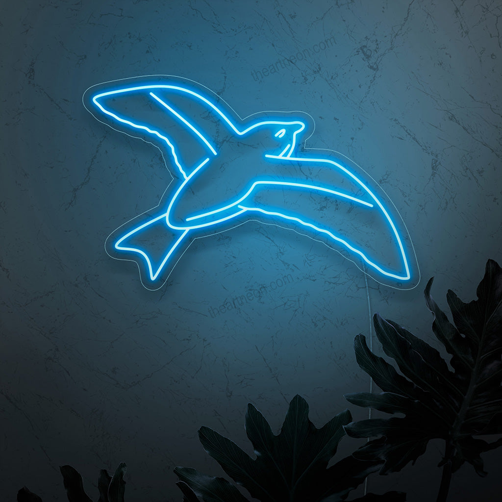 "Bird in Flight Neon Sign" - Siro neonvalo, jossa on lentävän linnun siluetti ja joka tuo luonnon inspiroimaa eleganssia ja vapautta asuintilaasi.