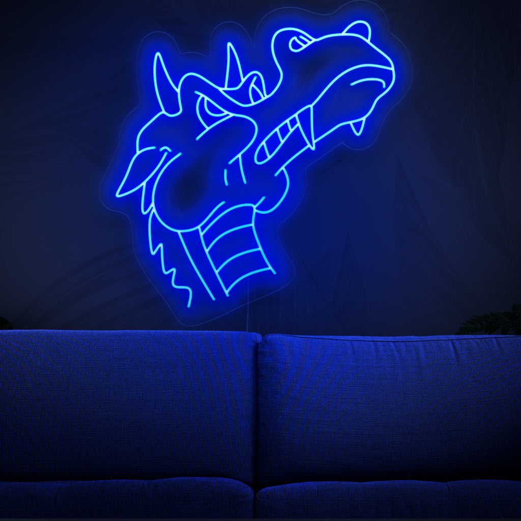 "Blue Dragon Neon Sign" - Mystinen neonvalo, jossa on majesteettisen sinisen lohikäärmeen siluetti, joka tuo lumoa ja fantasiaa asuintilaasi.