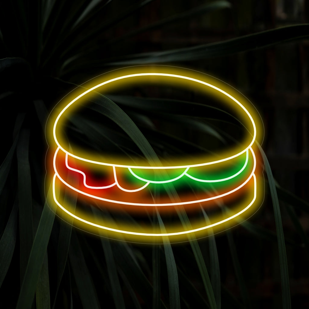 "Burger Neon Sign" on ihastuttava lisä ravintolan sisustukseen, jossa on yhden hampurilaisen taiteellinen esitys. Valaise tilaasi tämän neonvalon kutsuvalla hehkulla, joka on täydellinen luomaan suussa sulavaa tunnelmaa.