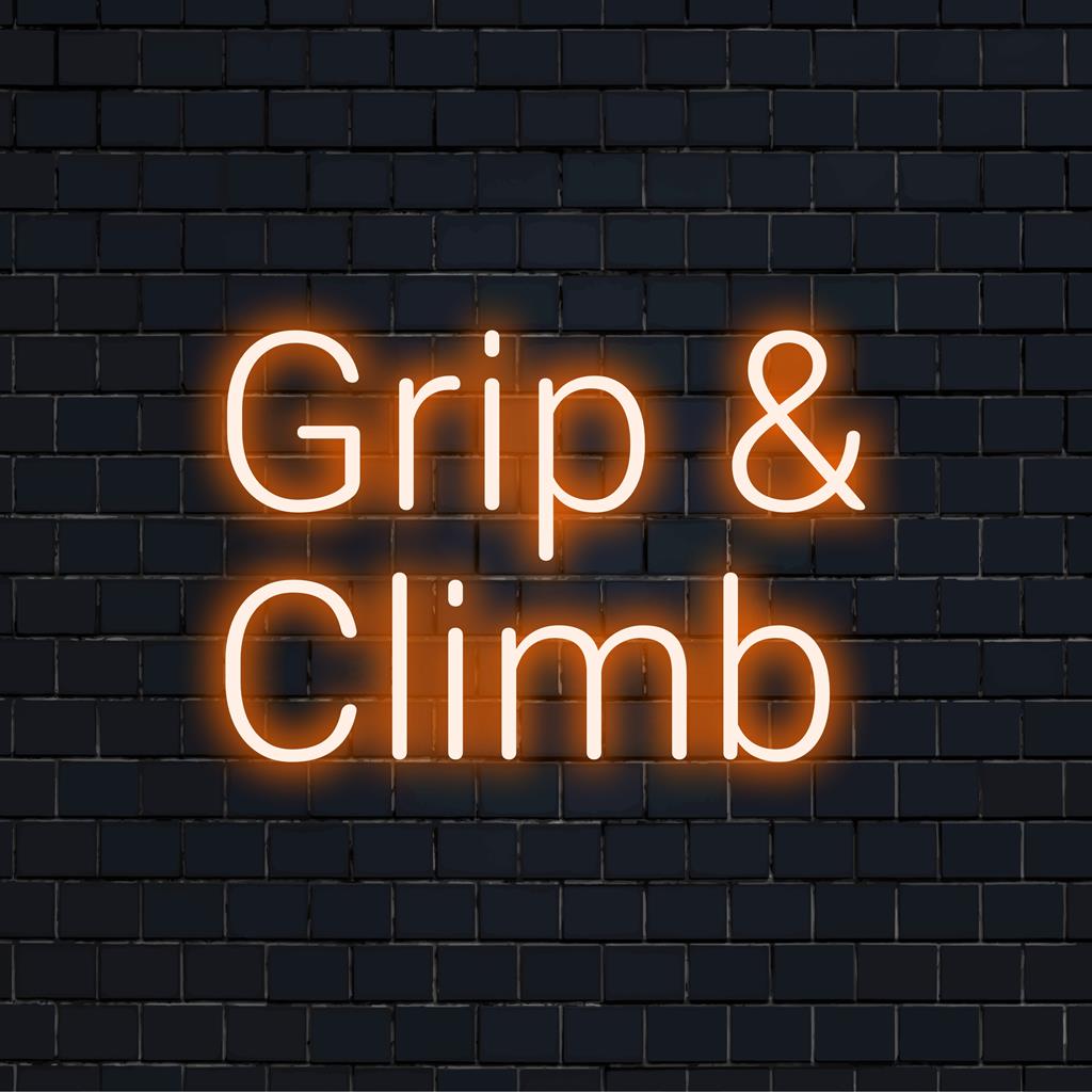 Mukautettu LED-neonkyltti Grip and Climb, joka esittelee kirkasta typografiaa ja luovuutta ainutlaatuiseen sisustukseen.