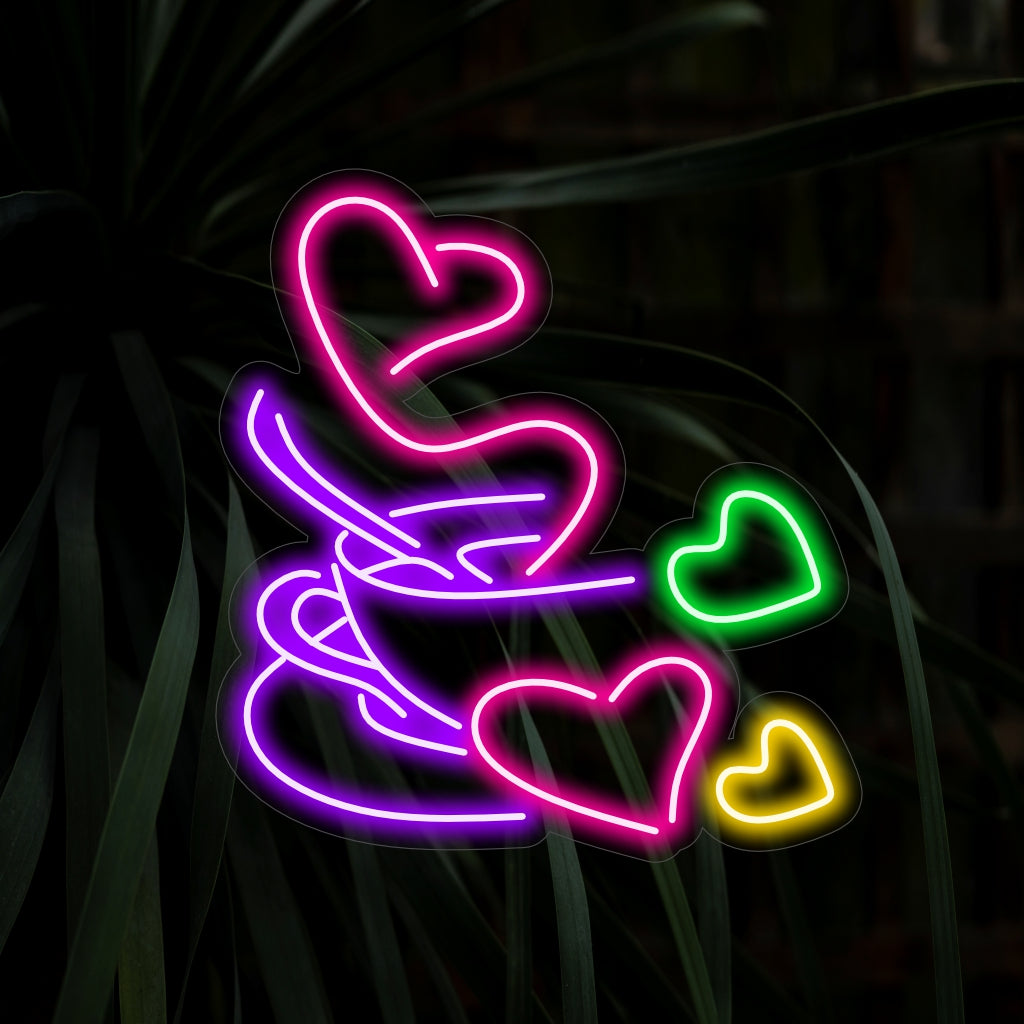 "Hot Coffee Cup With Heart Shape Neon Sign" - Romanttinen ja kutsuva lisä kahviloihin, jossa on sydämen muotoinen höyryävä kahvikuppi, joka luo viehättävän ja rakkauden täyttämän tunnelman.