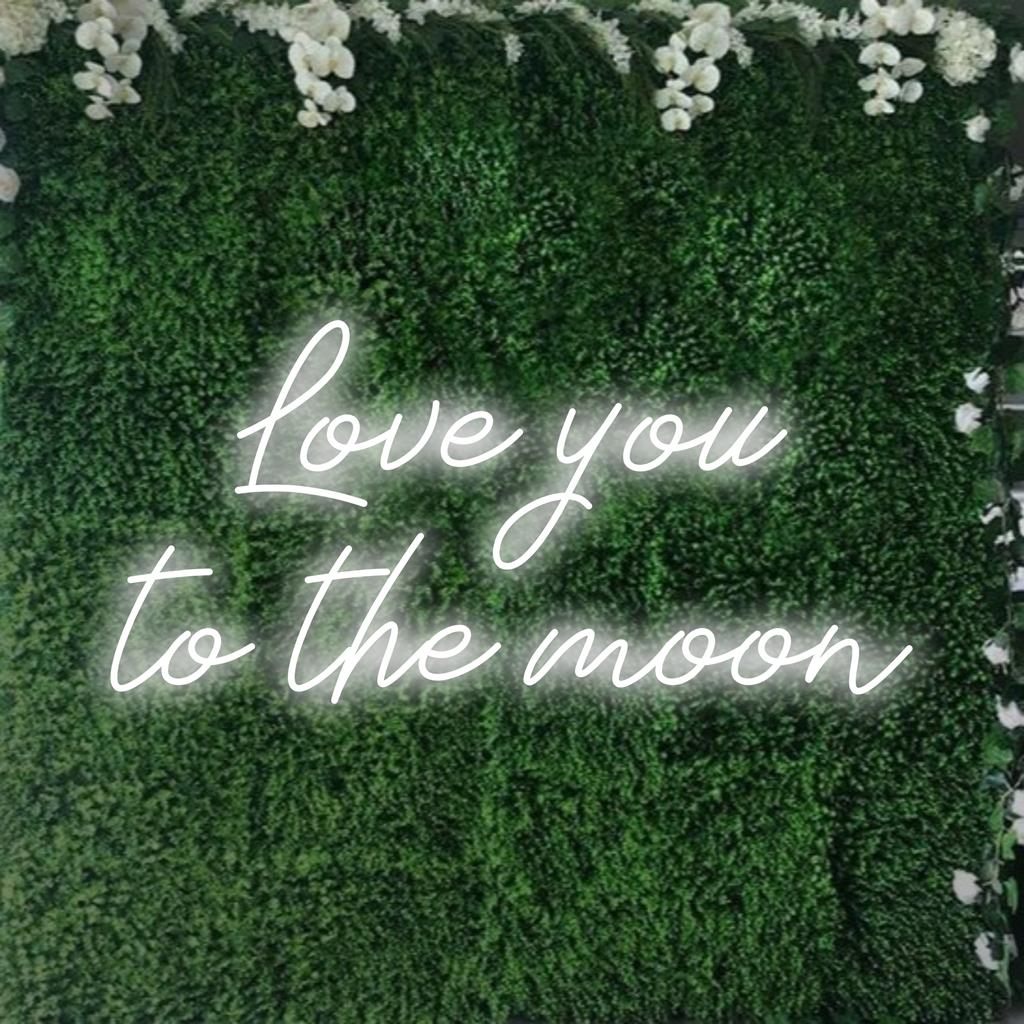 Mittatilaustyönä valmistettu neonkyltti, jossa on Love You To The Moon -teksti hehkuvalla LED-valolla, sopii erinomaisesti persoonalliseen neonlainaussisustukseen.