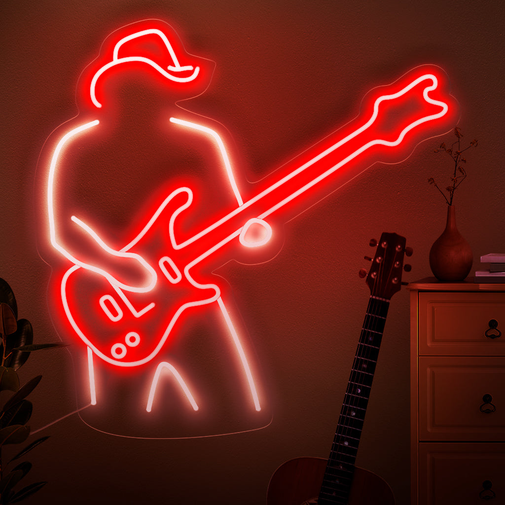 "A Man Plays The Guitar Neon Sign" vangitsee musiikillisen intohimon olemuksen kitaraa koskettavalla siluetilla. Korosta tilaasi tämän tyylikkään ja kiehtovan neonvalon rytmisellä hehkulla.