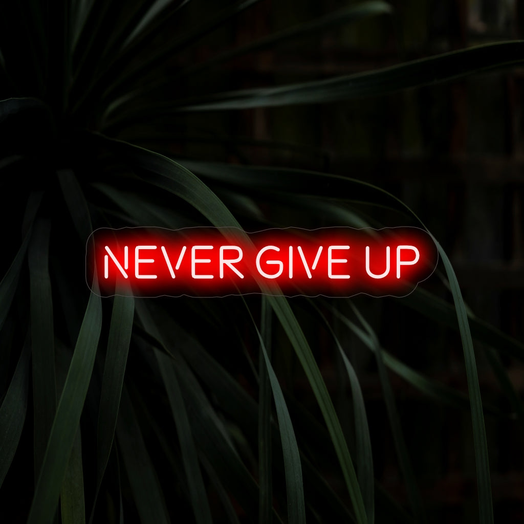 "Never Give Up Neon Sign" on motivoiva ja voimaannuttava lisäys, joka on täydellinen tiloihin, jotka inspiroivat kestävyyttä ja päättäväisyyttä. Valaise horjumattomalla hengellä!