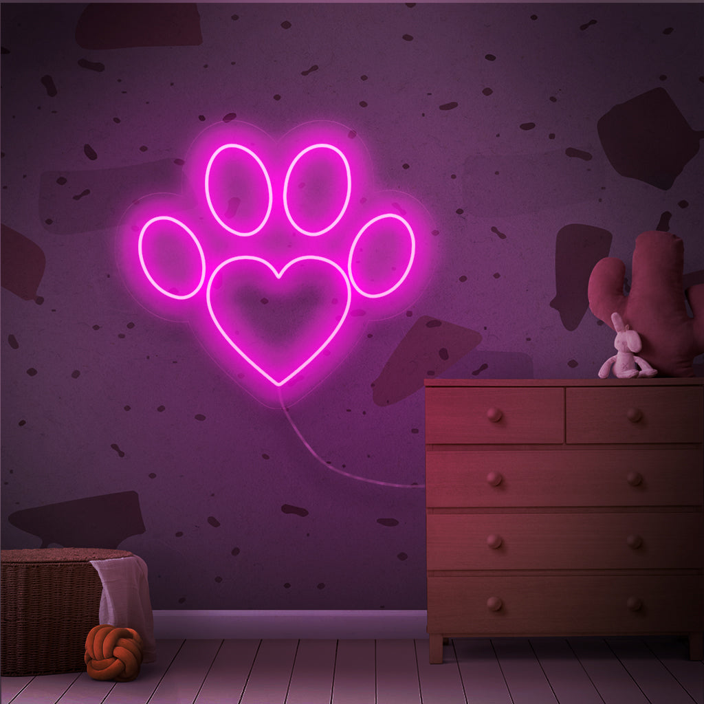 "Paw Neon Sign" on viehättävä ja sydäntä lämmittävä lisäys, joka sopii täydellisesti tiloihin, joissa juhlitaan rakkautta lemmikkeihin. Valaise tassunjäljen lämmöllä!