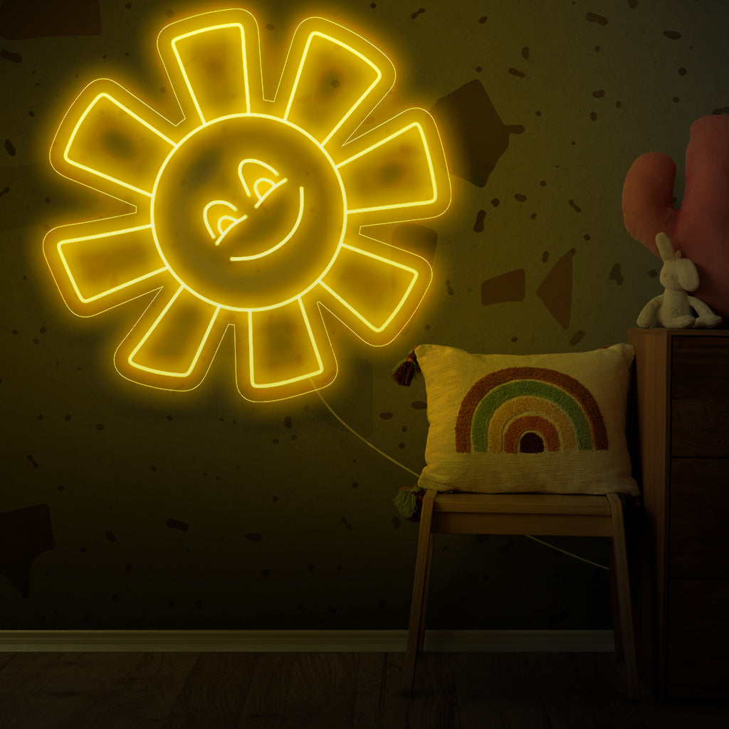 Hymyilevä aurinko -valokyltti, joka huokuu kirkkaita ja iloisia tunnelmia, tuo eloisaa ja valaistua charmia mihin tahansa tilaan.