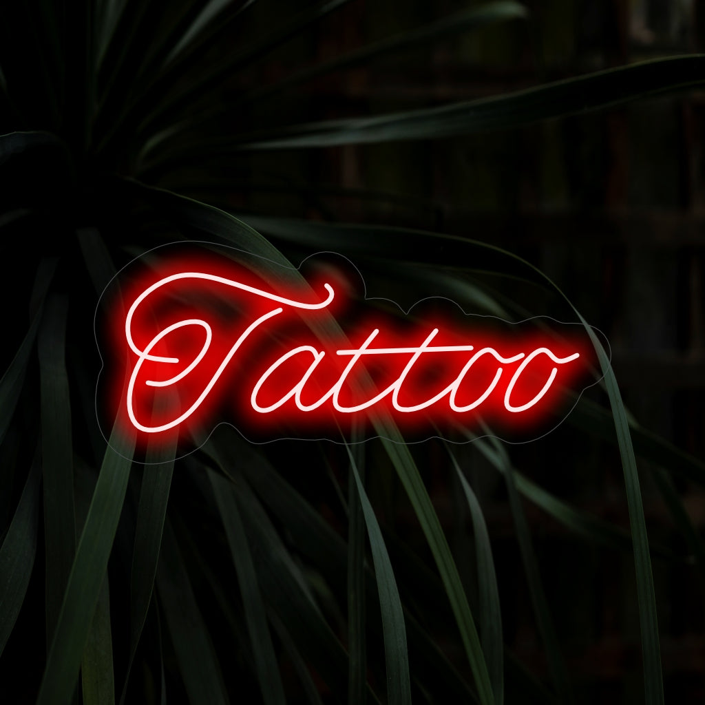 "Tattoo Neon Sign" lisää eloisaa taiteellisuutta ikonisella muotoilullaan ja luo rohkean hehkun, joka juhlii tatuointien luovuutta ja kauneutta tilassasi.