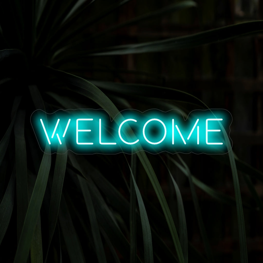 "Welcome Neon Sign" iloisella hehkullaan tervehtii vieraita lämpimästi ja kutsuu luoden vieraanvaraisen tunnelman tilaan.