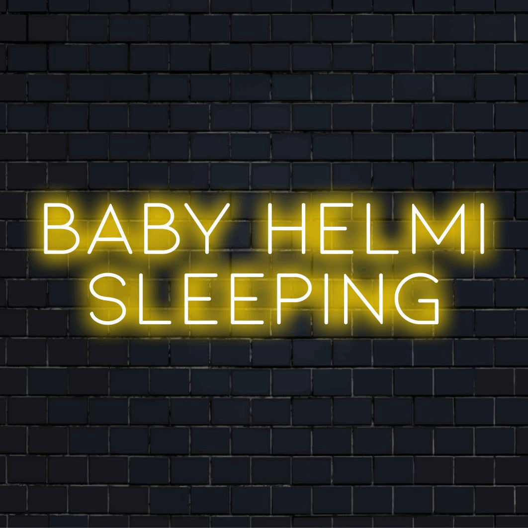 Baby Helmi Sleeping Personalized LED Neon Sign, neon text light against brick backdrop