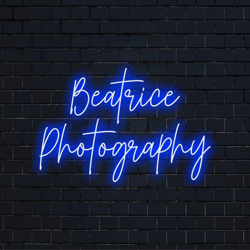 Beatrice Photography Custom Name Neon Sign, neon text light on dark brick wall