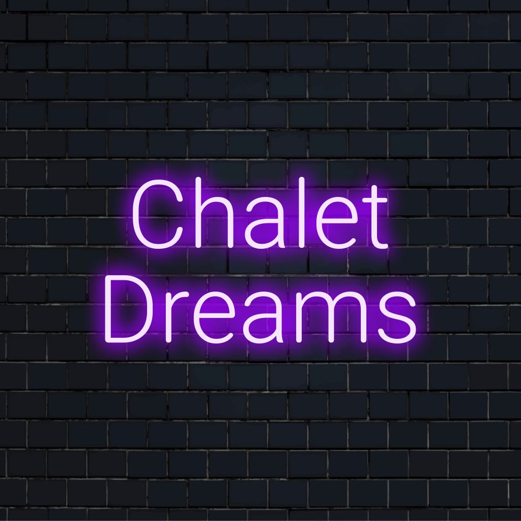 Chalet Dreams LED Neon Sign, bright neon lettering on dark brick background