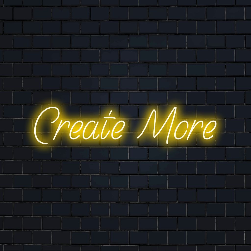 Create More LED Neon Sign, glowing wall decor against brick backdrop