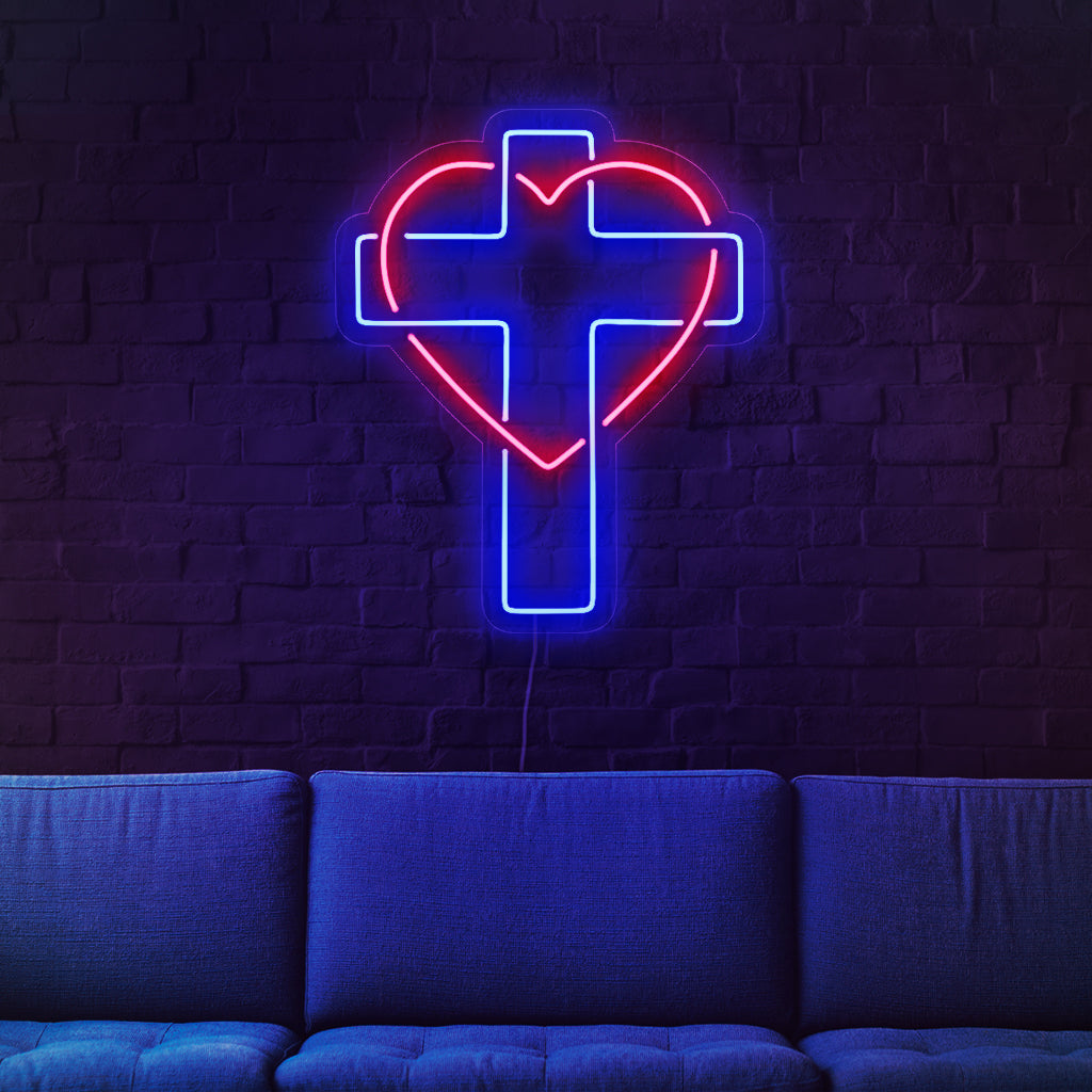 "Cross And Heart Neon Sign" ��� Hengellinen neonvalo, joka esittelee symbolista ristiä ja sydäntä, joka täyttää tilaan lämpöä.