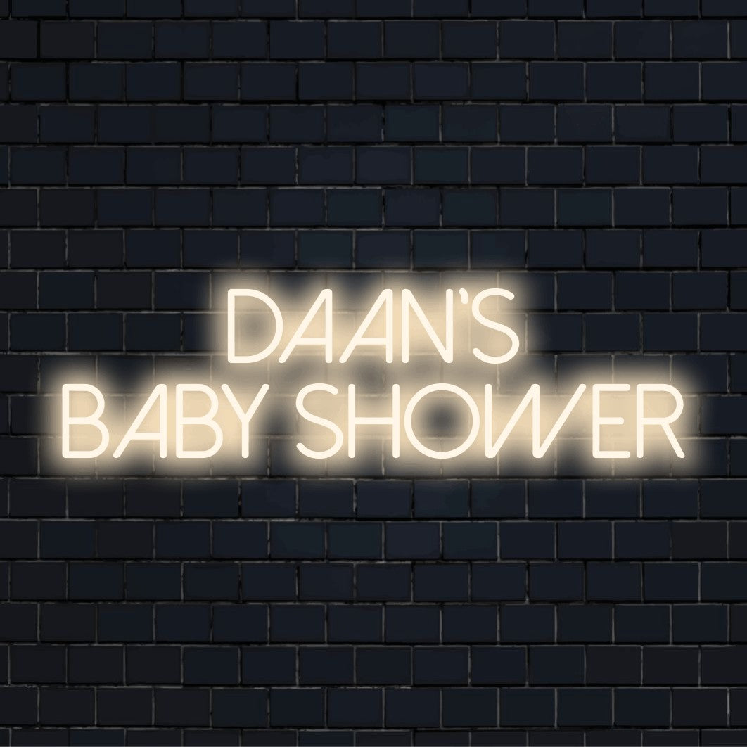 Daan_s Baby Shower Personalized LED Neon Sign, bright neon glow on black brick background