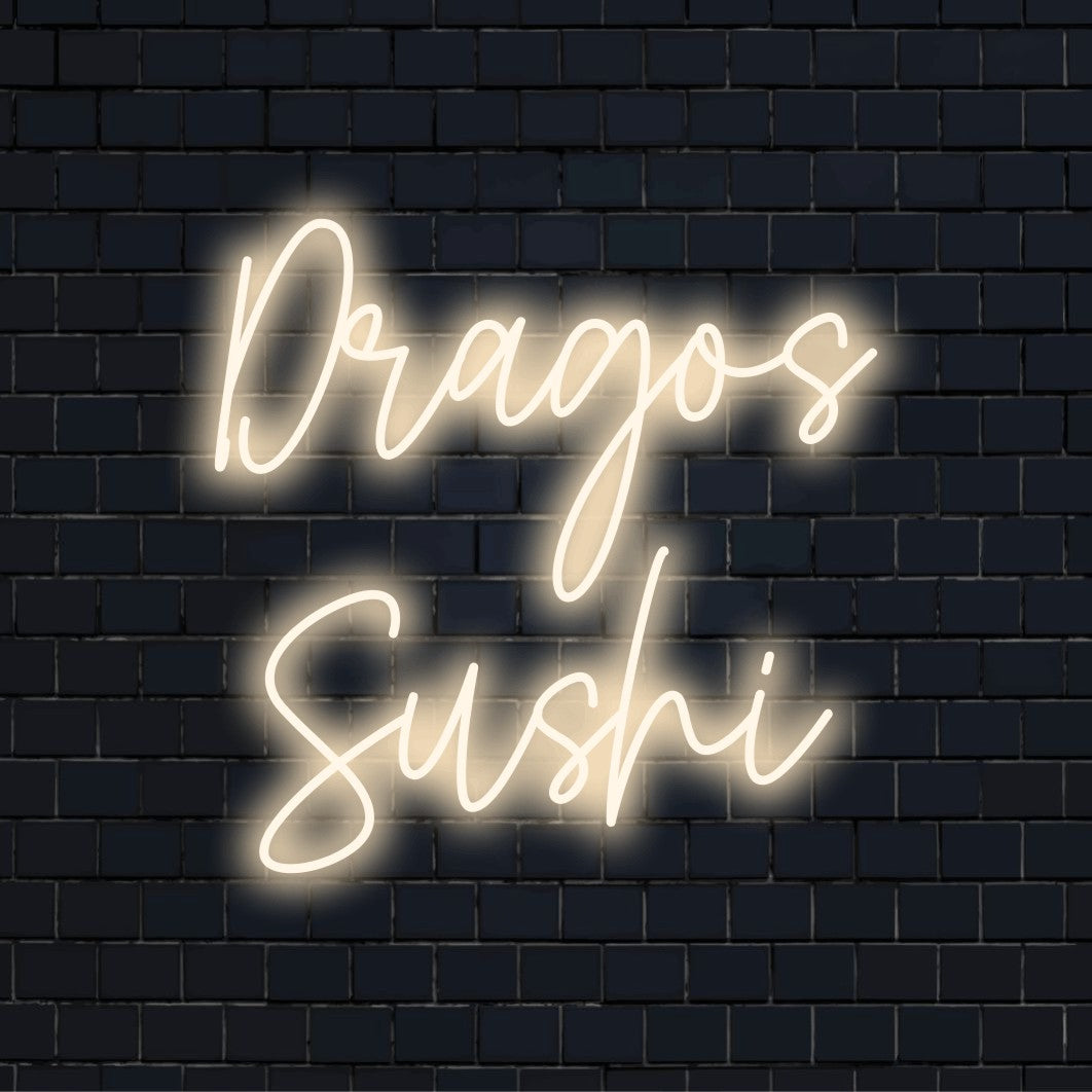 Dragos Sushi Custom Name Neon Sign, neon text light against black brick wall
