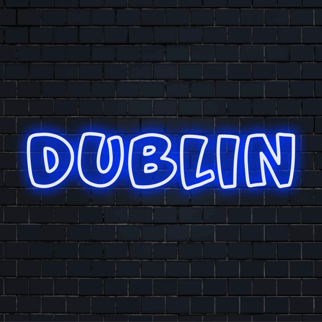 Dublin Neon Sign, bright LED glow against black brick wall