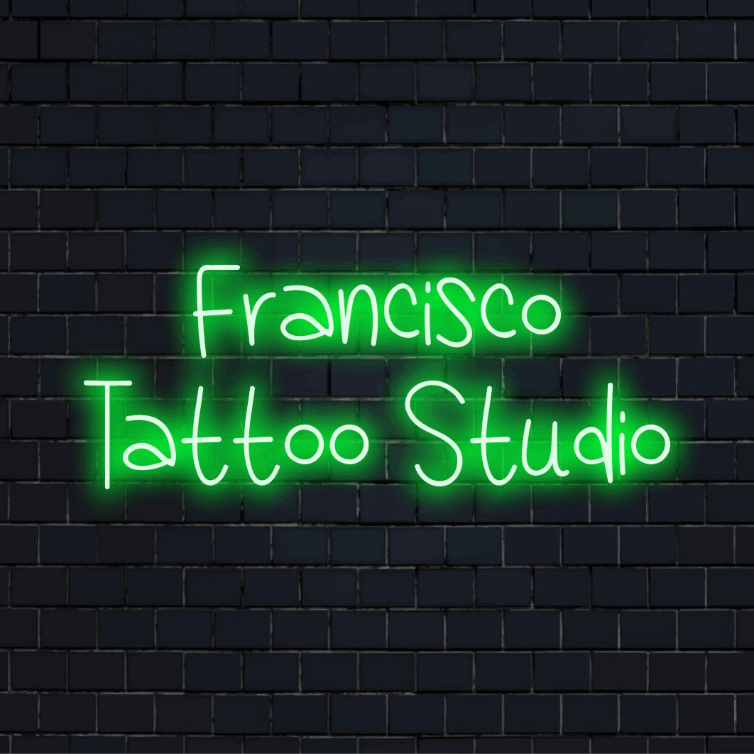 Francisco Tattoo Studio Personalized LED Neon Sign, glowing wall decor on dark brick background