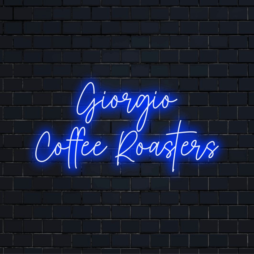 Giorgio Coffee Roasters Personalized Neon Light with bright LED glow on black brick background
