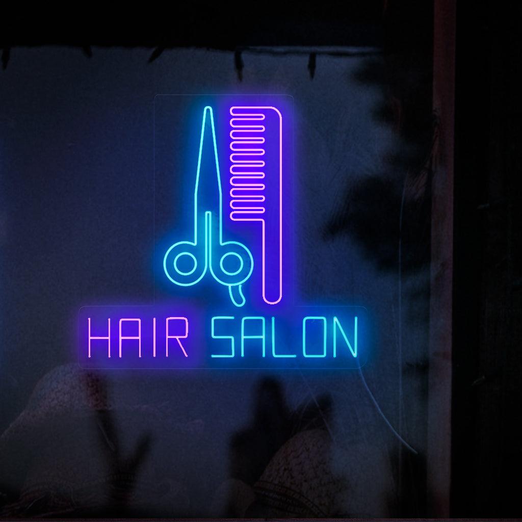 Tyylikäs ja tyylikäs neonkyltti, jossa on sakset ja kampa, ja sanat 'Hair Salon' on valaistu kirkkailla neonvaloilla.