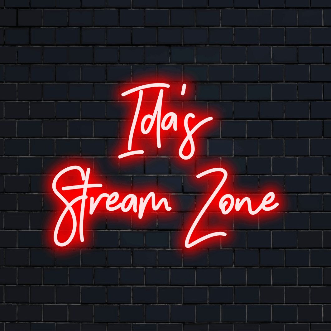 Ida_s Stream Zone Personalized LED Neon Sign, glowing lettering against brick backdrop