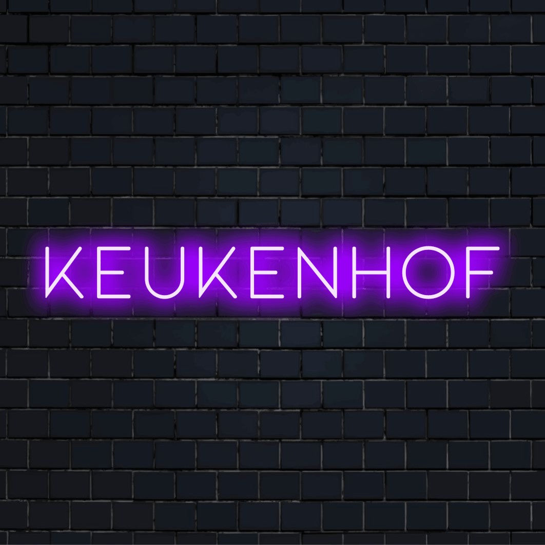 Keukenhof Neon Sign, bright neon lettering on dark brick wall