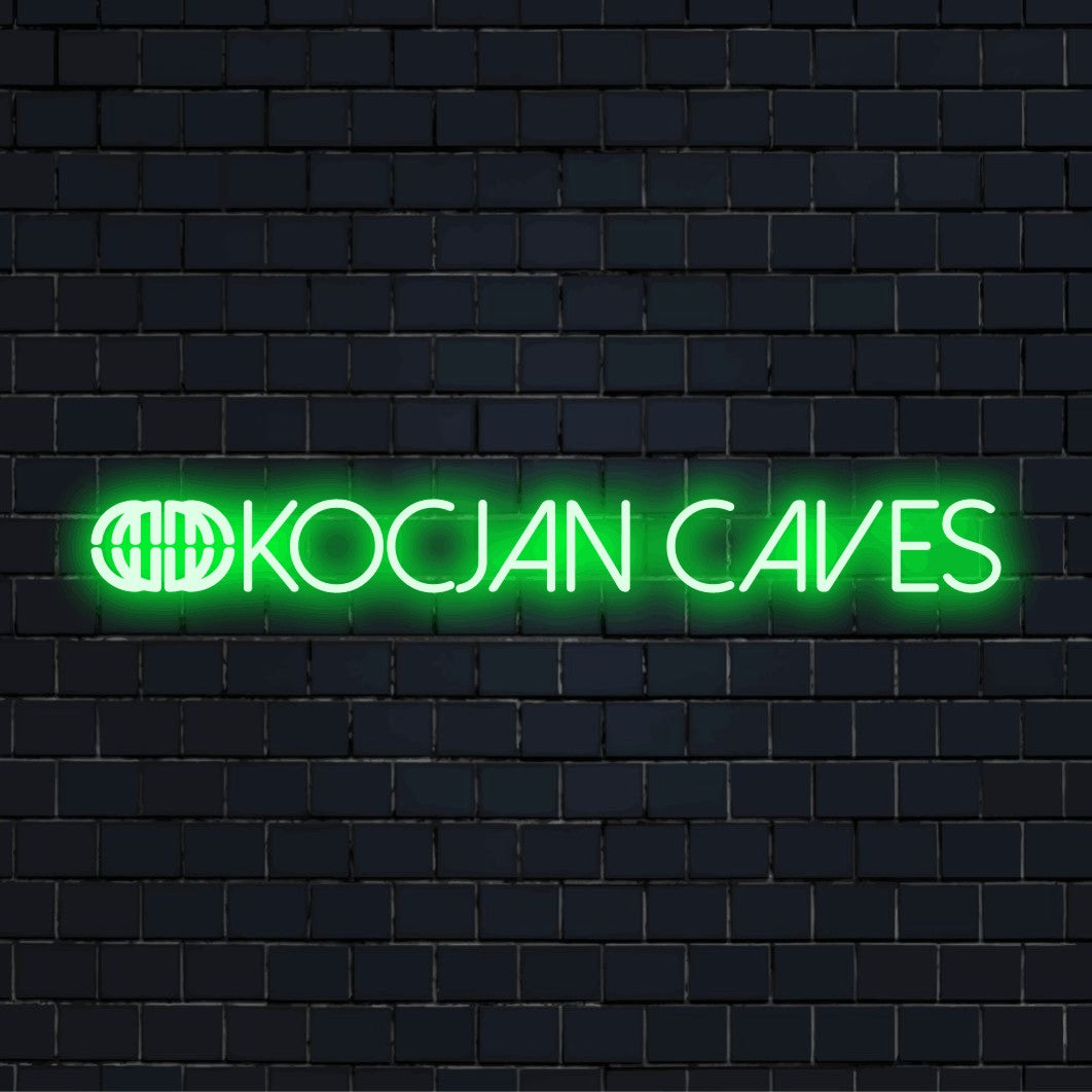 Kocjan Caves Neon Sign, neon text light on dark brick wall