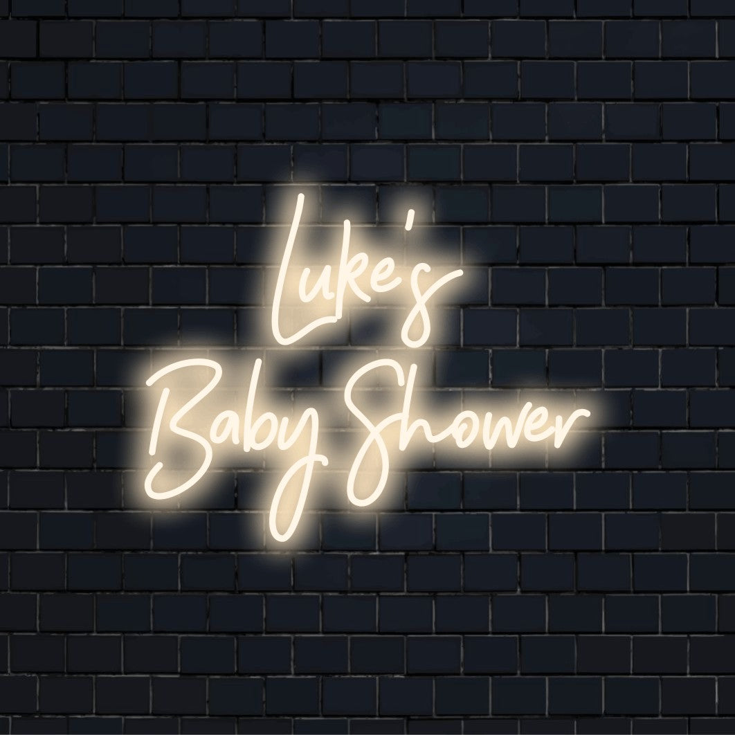 Luke_s Baby Shower Personalized LED Neon Sign, bright neon glow against brick backdrop