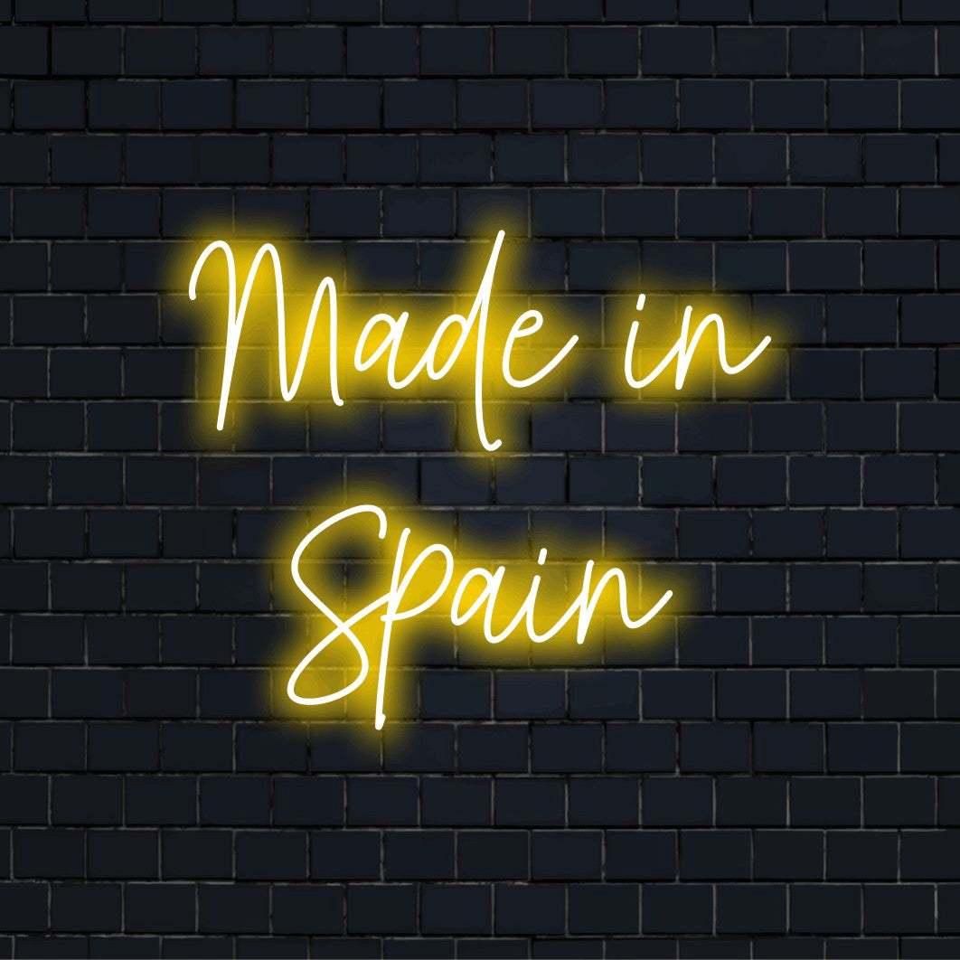 Made In Spain LED Neon Sign, bright LED glow on black brick background