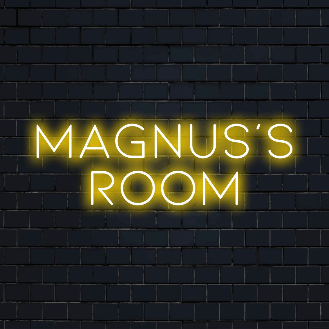 Magnus_s Room Custom Name Neon Sign, glowing lettering against black brick wall