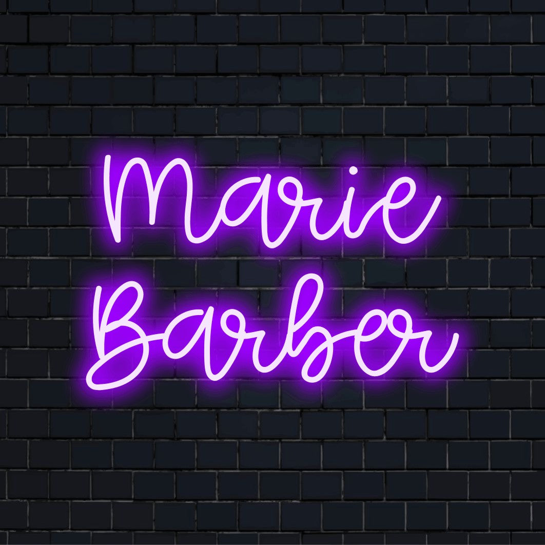 Marie Barber Personalized LED Neon Sign, glowing neon text against black brick wall