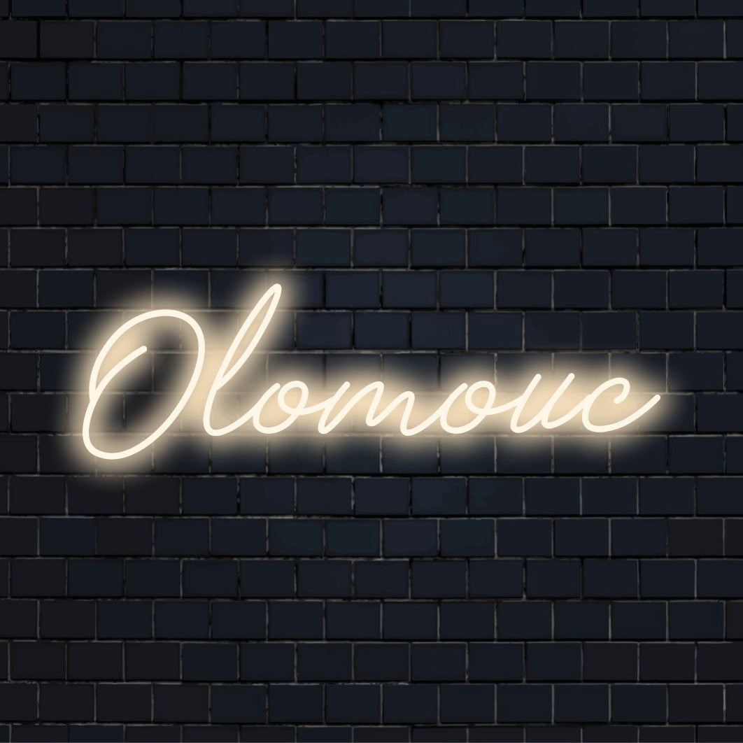 Olomouc Neon Sign, bright neon glow against brick backdrop