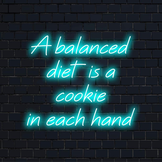 Mukautettu LED-neonkyltti, jossa on humoristinen tasapainolainaus keksistä molemmissa käsissä, täydellinen omituiseen seinätaiteen sisustukseen.