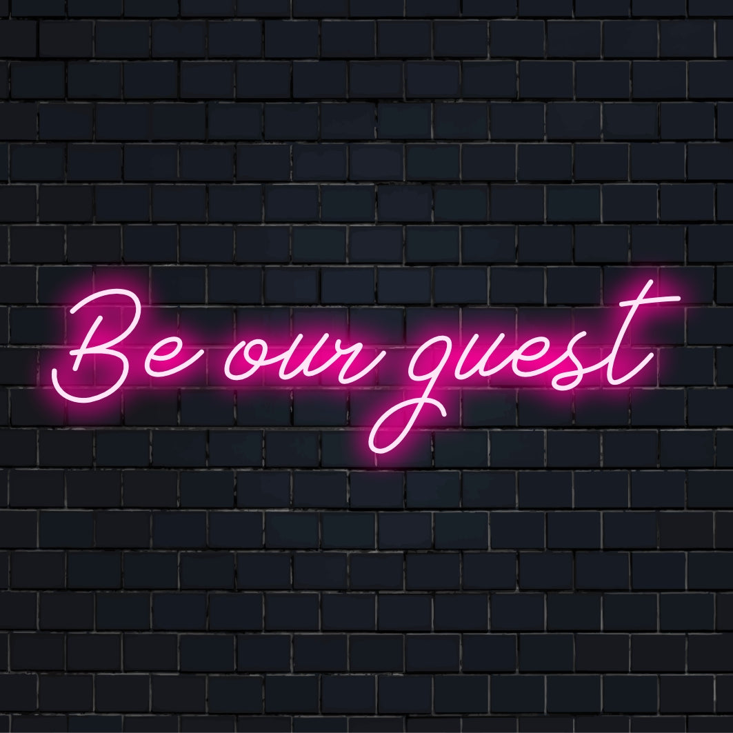 LED neon sign with Be Own Guest phrase customized in bright, flowing script. A stylish, personalized decor statement.