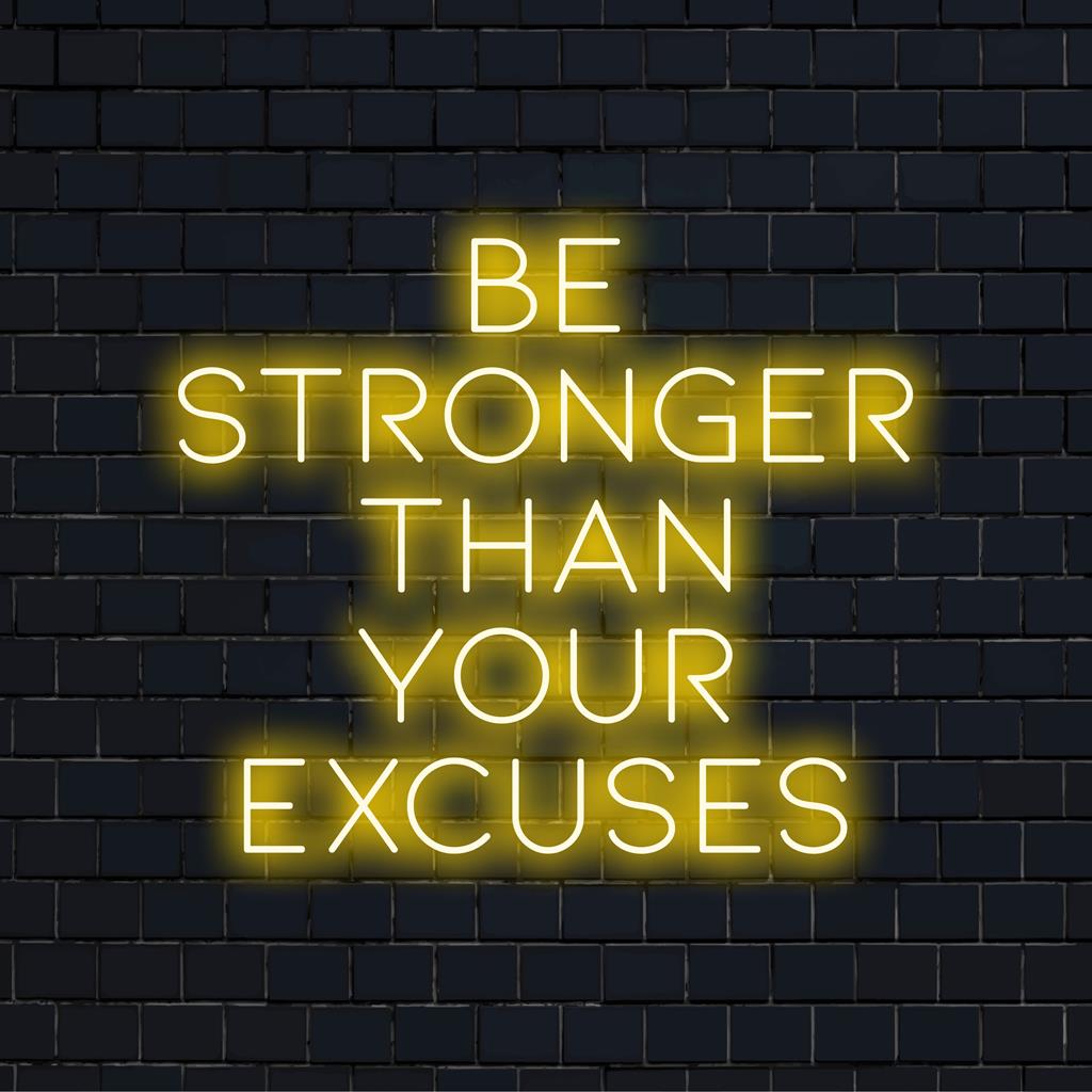 Mittatilaustyönä valmistettu LED-valokyltti Be Stronger Than Your Excuses, täydellinen motivoivaan sisustukseen ja persoonalliseen seinätaiteeseen.