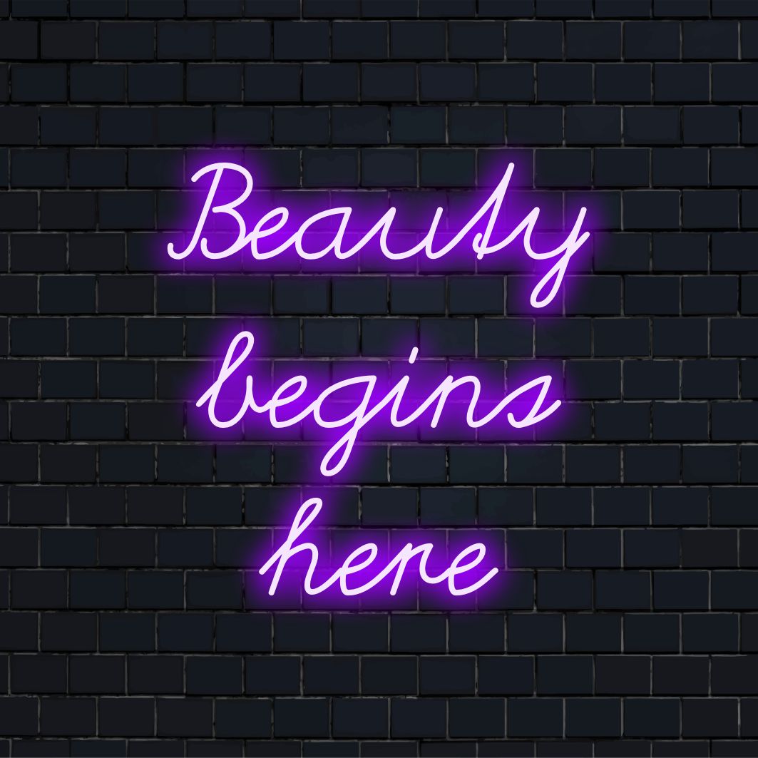 Monipuolinen LED-valokylttiluku Beauty Begins Here yhdistää neonlainaustaidetta räätälöityihin LED-designelementteihin.
