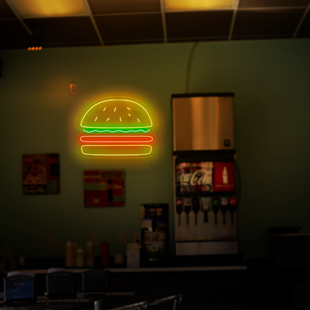 "Burger Neon Sign" - Ett aptitretande neonljus med den ikoniska symbolen för en hamburgare, som ingjuter en atmosfär av läckerhet och en kärlek till klassiska snabbmatsfavoriter i din hamburgare eller restaurang.