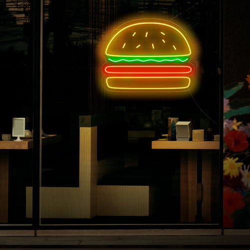 "Burger Neon Sign" - Suussa sulava neonvalo, jossa on hampurilaisen ikoninen symboli ja joka tuo herkullisen tunnelman ja rakkauden klassisiin pikaruokasuosikkeihin hampurilaisravintolaasi.