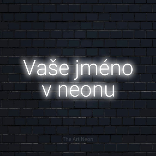 Neonový nápis na míru „Vaše jméno v neonu“ na černé cihlové zdi