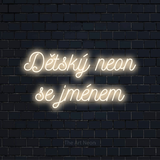 Neonový nápis na míru „Dětský neon se jménem“ na černé cihlové zdi
