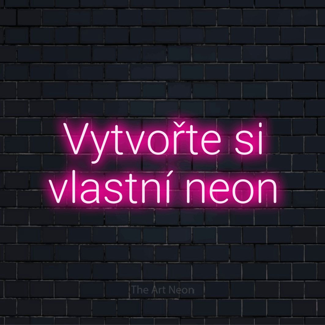 Neonový nápis na míru „Vytvořte si vlastní neon“ na černé cihlové zdi