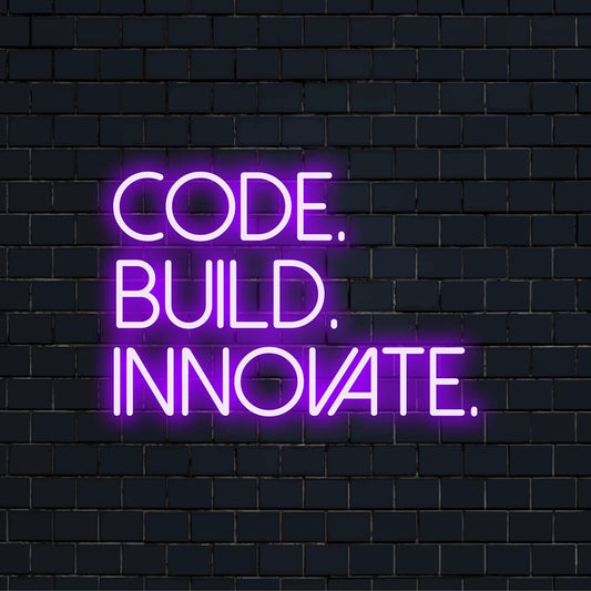 LED neon sign showcasing Code, Build, Innovate - bold and vibrant words, perfect for personal inspiration and decor.