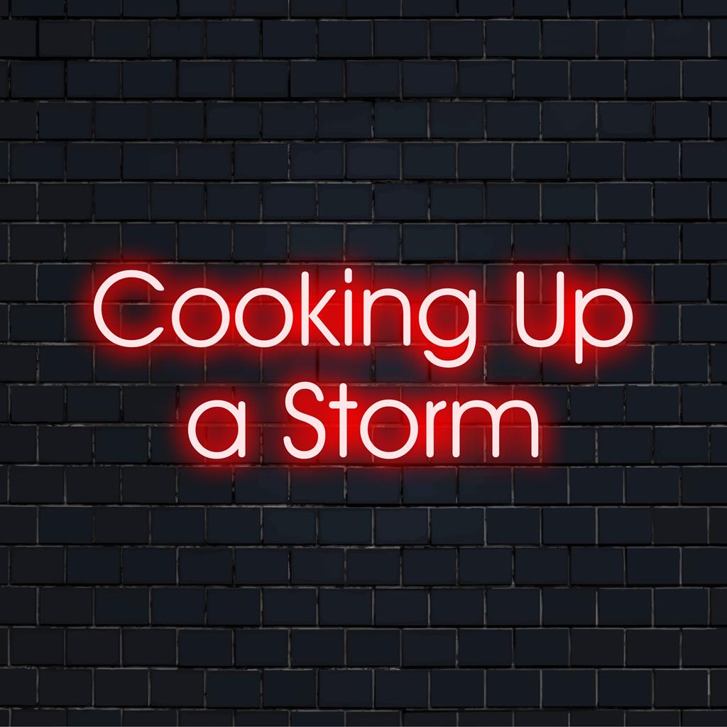 Neonkyltti, jossa on ilmaisu Cooking Up A Storm, muotoiltu kirkkailla LED-kirjaimilla. Täydellinen keittiön sisustukseen.