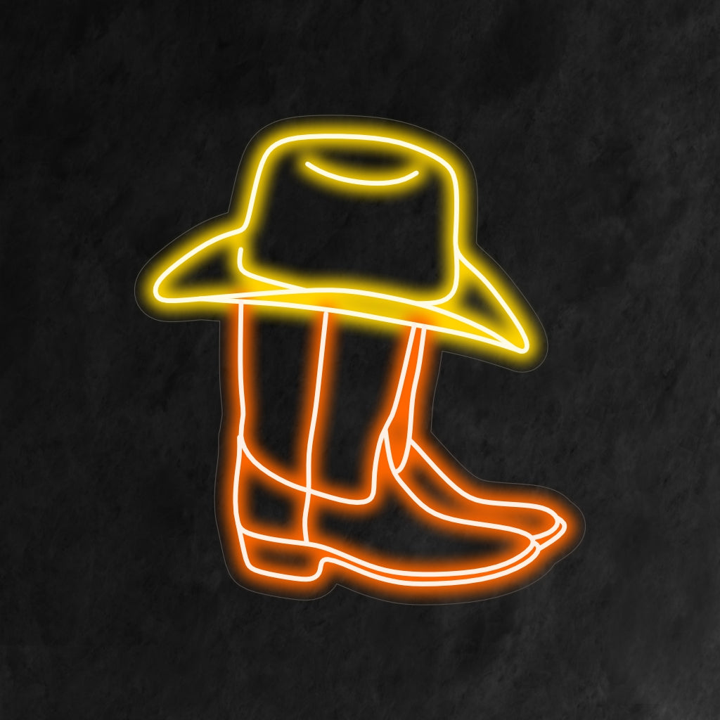 Mittatilaustyönä valmistettu LED-valokyltti, jossa on yksityiskohtaiset cowboy-saappaat ja cowboyhattu neonmuotoilu, ihanteellinen ainutlaatuiseen seinäkoristeeseen.