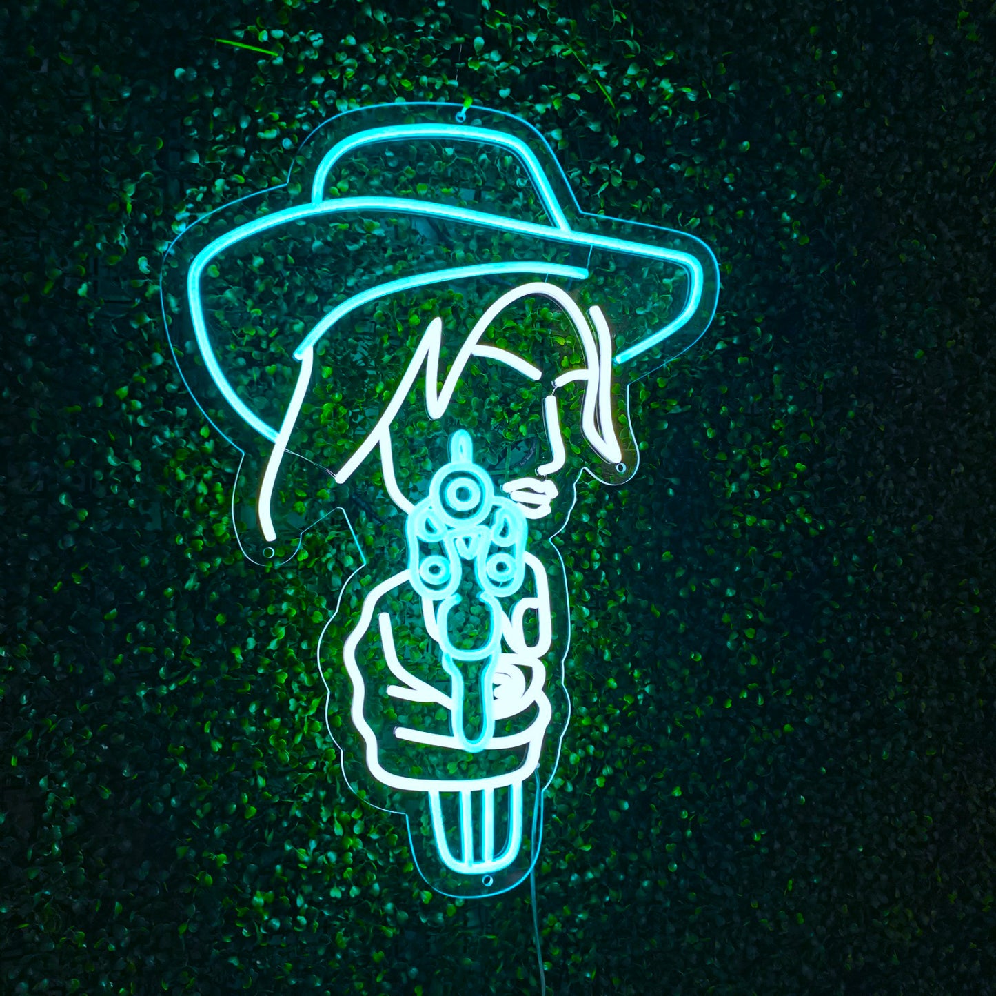 "Cowgirl Pointing Gun Neon Sign" – A bold neon light showcasing a cowgirl silhouette, infusing your space with daring energy.