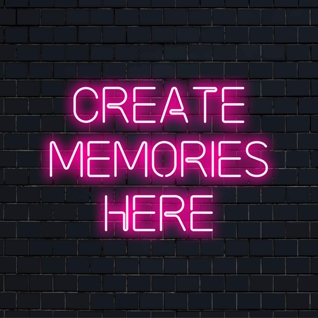 Mukautettu LED-neonkyltti, jossa on Create Memories Here eloisalla tekstillä, täydellinen yksilöllisen tunnelman luomiseen.
