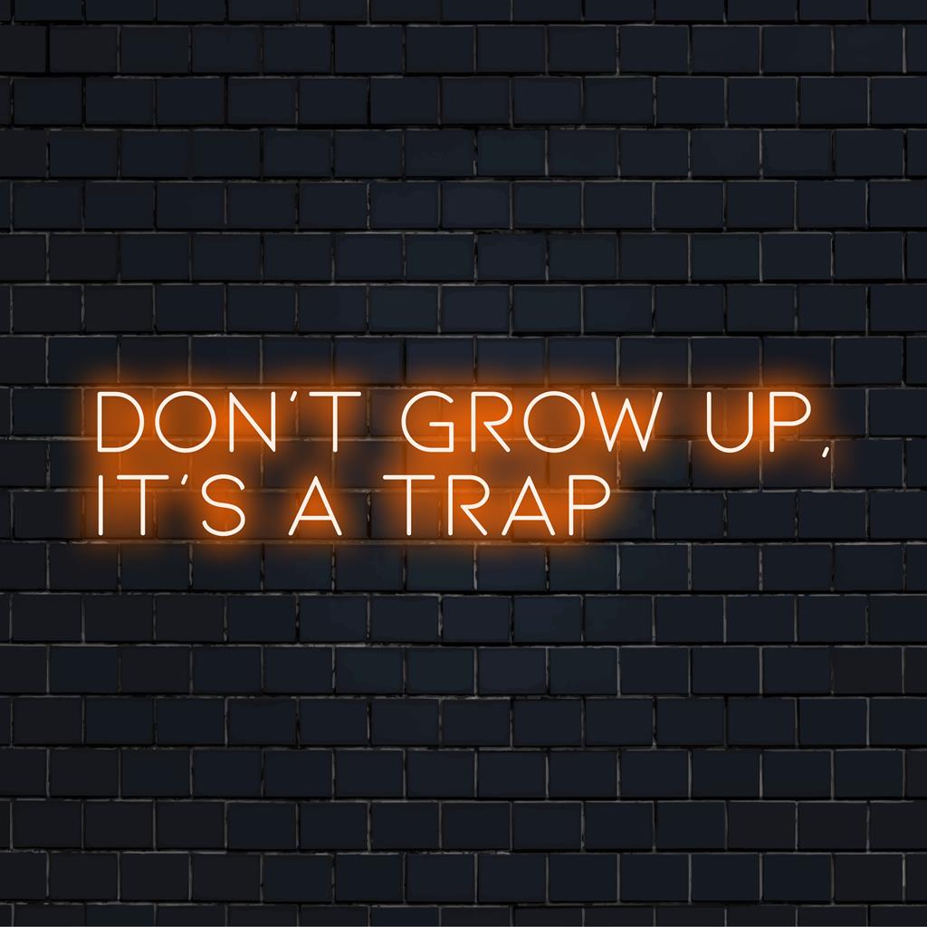 Mittatilaustyönä valmistettu LED-valokyltti, jossa lukee Don't Grow Up It's A Trap���silmää hivelevä neonviesti mihin tahansa tilaan.