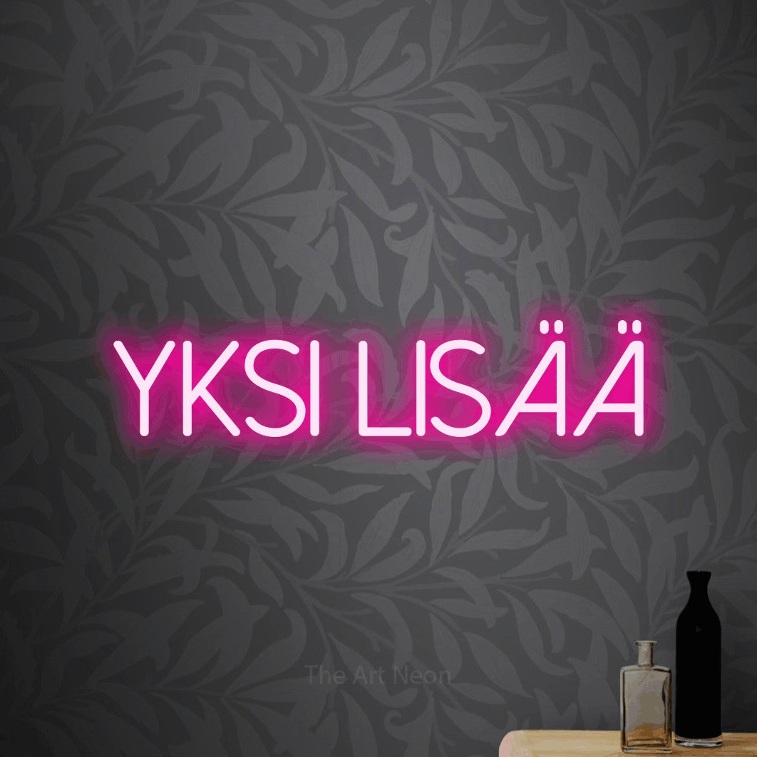 LED neon sign reading “Yksi lisää”, arranged in a single line.