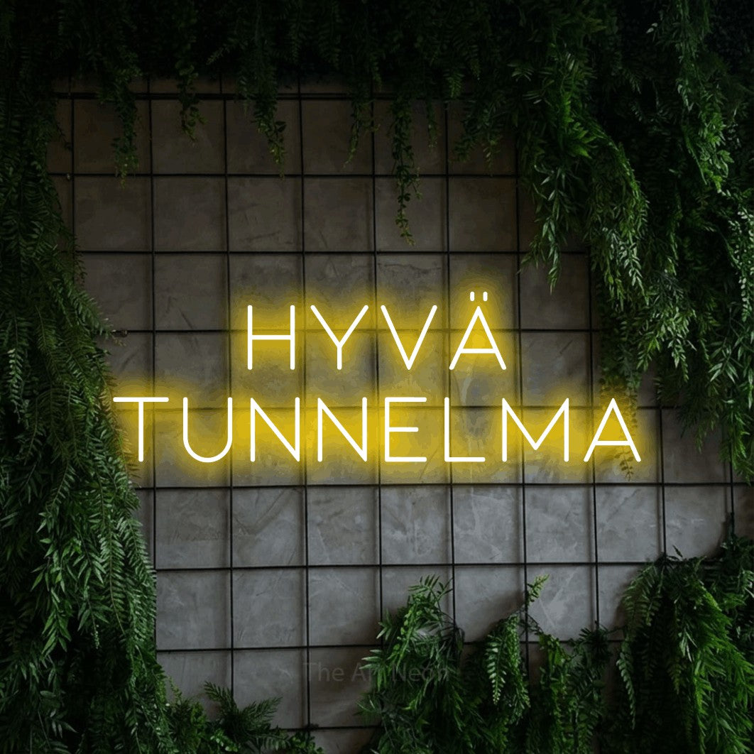 LED neon sign reading “hyvä TUNNELMA”, arranged in 2 lines.